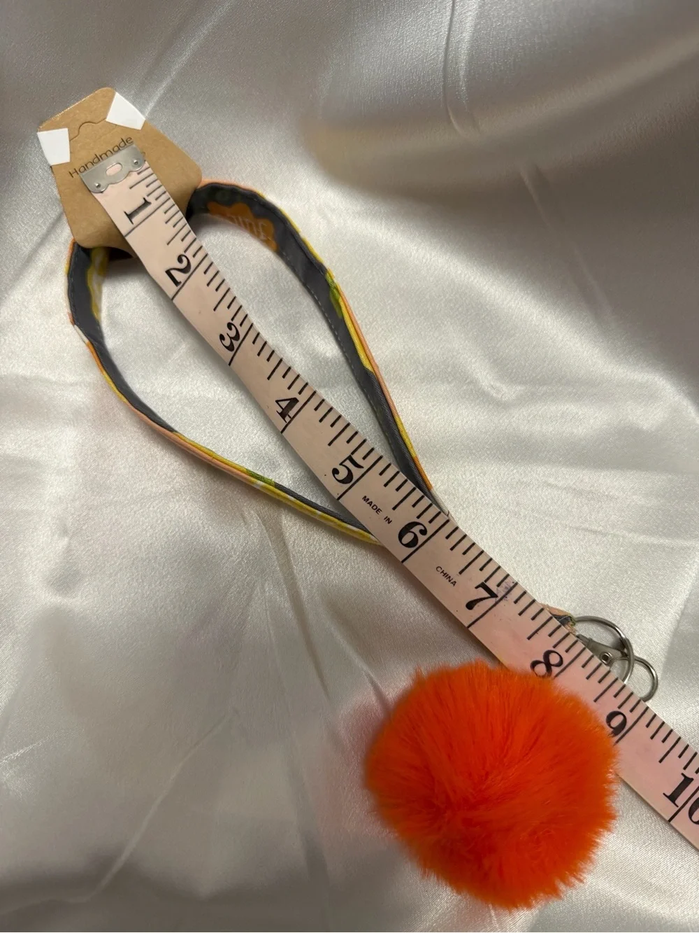 Handmade Orange Pattern Wristlet Keychain with Orange Pompom